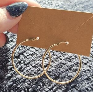 14k hoop earrings. Stamped 14k. Weight approximately 1.4 grams. See all pics for